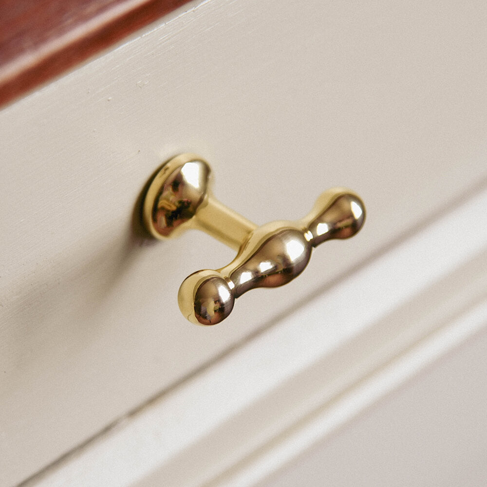 Brass Anchor T Bar Drawer Pull on a cabinet