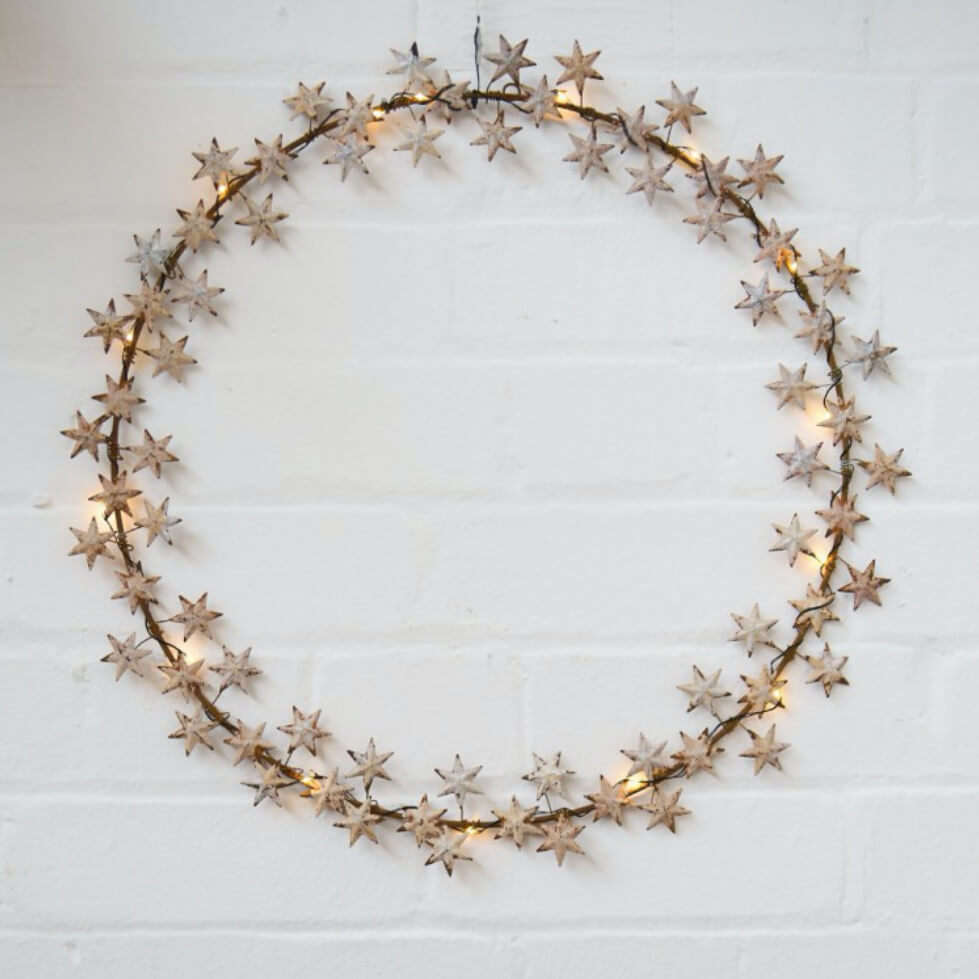 LED Fairylight Star wreath on white wall