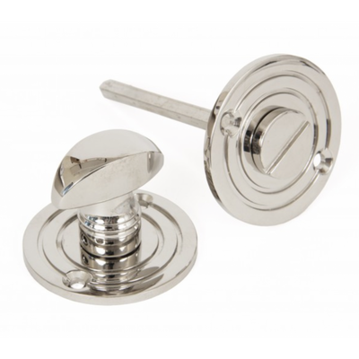 A bathroom thumbturn with spindle in polished nickel