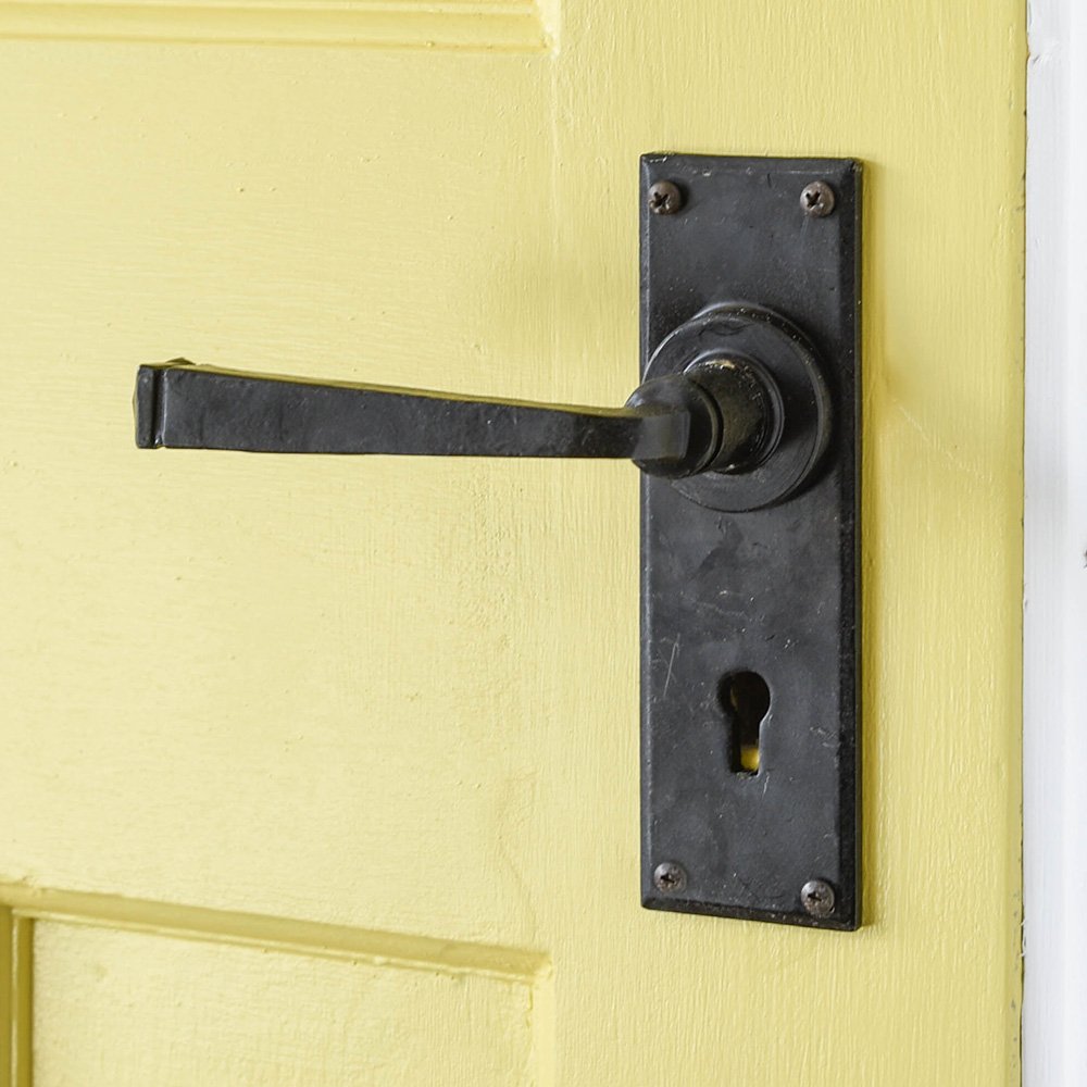 A Berkeley Lever Door Handle in Black Beeswax with Keyhole Backplate