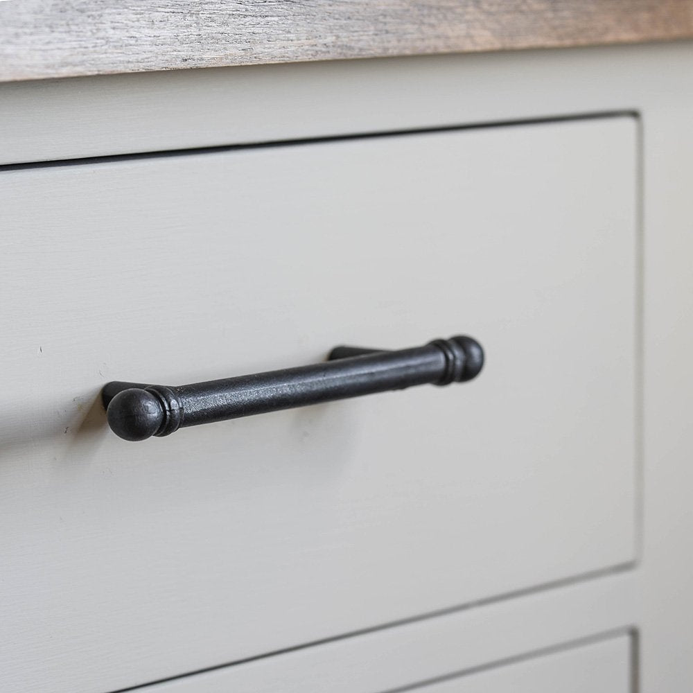 A rod pull handle fitted to drawers