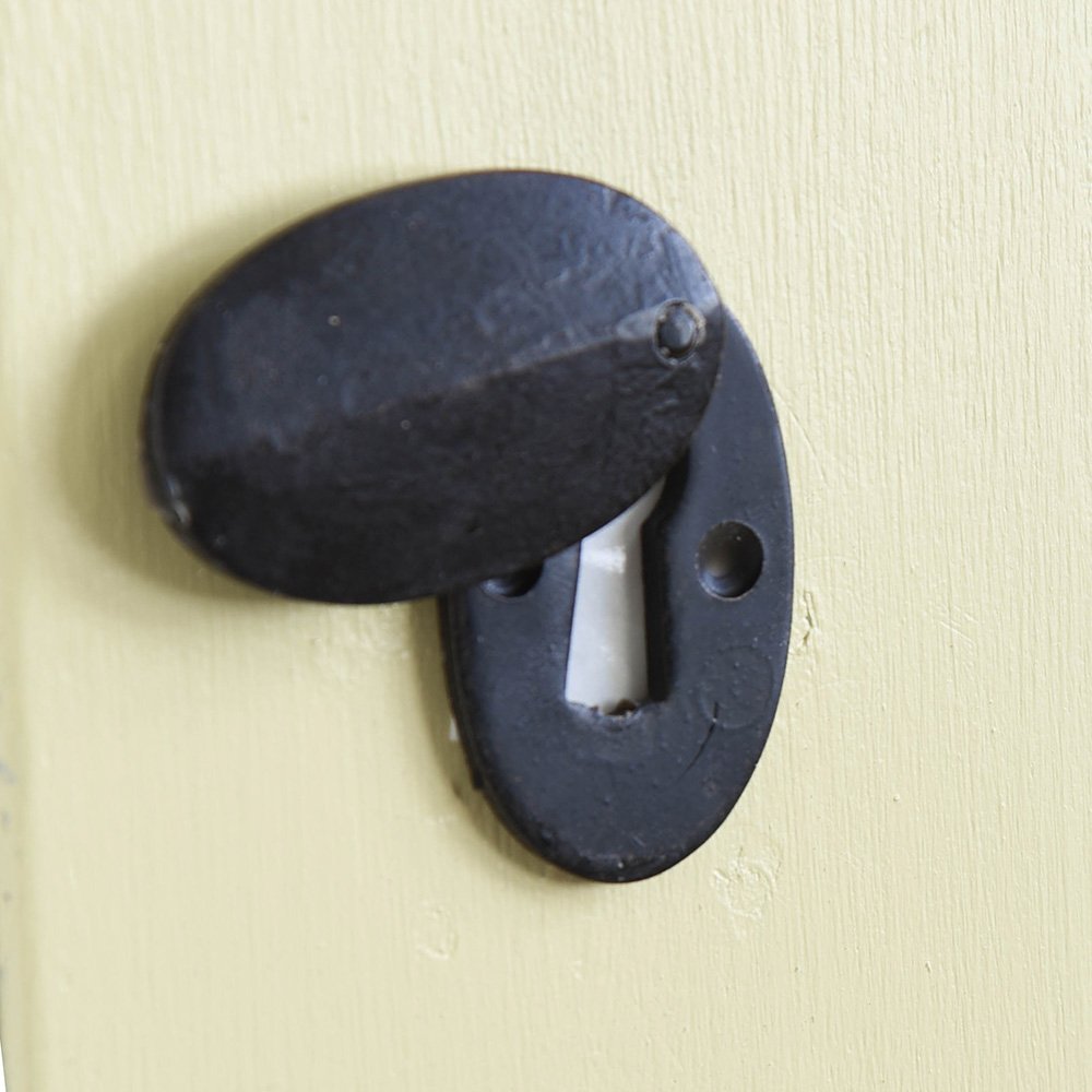 A Berkeley Oval Covered Escutcheon with the cover open