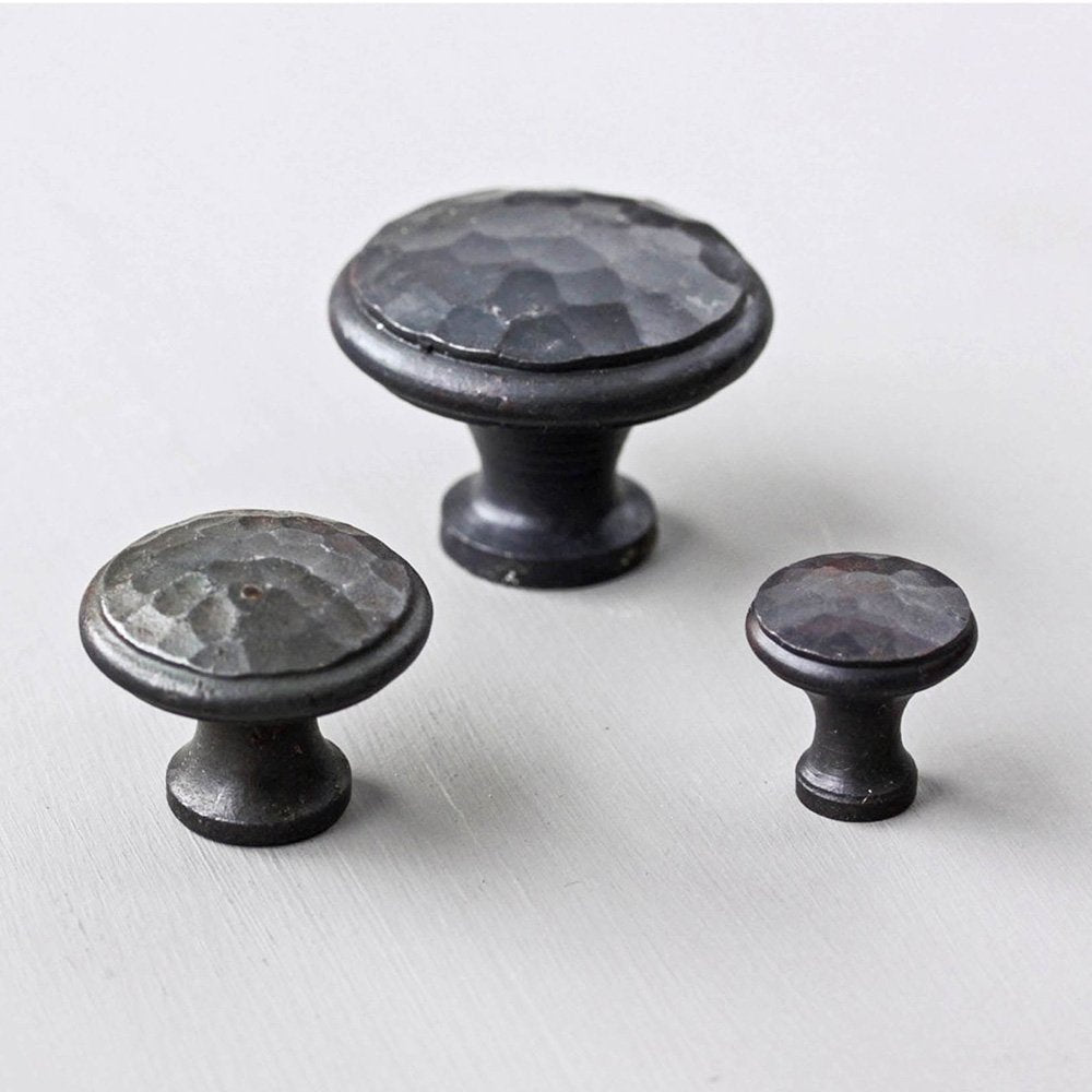 Forged black beeswax beaten cabinet knobs in 3 sizes. Small, medium and large