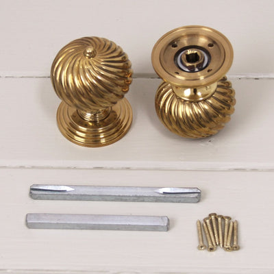 Brass burcot swirl door knobs and fittings