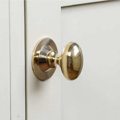 Brass oval cabinet knob with backplate