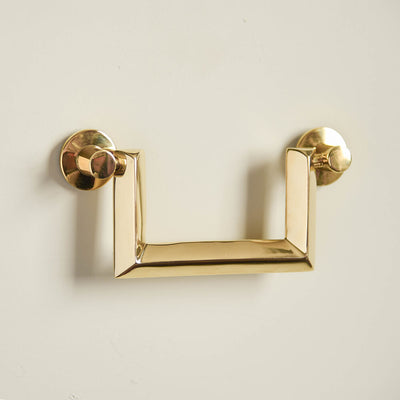 Regal Drop handles in polished brass for high end bathrooms