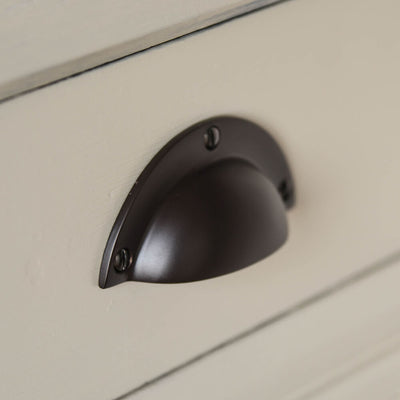 HOODED DRAWER PULL ON AN ANGLE