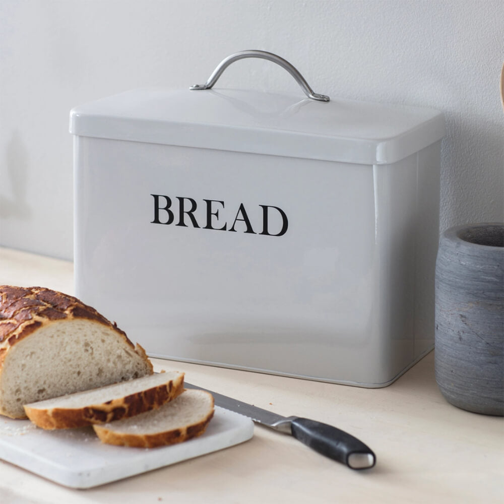 Chalk white bread bin with chopping board and loaf