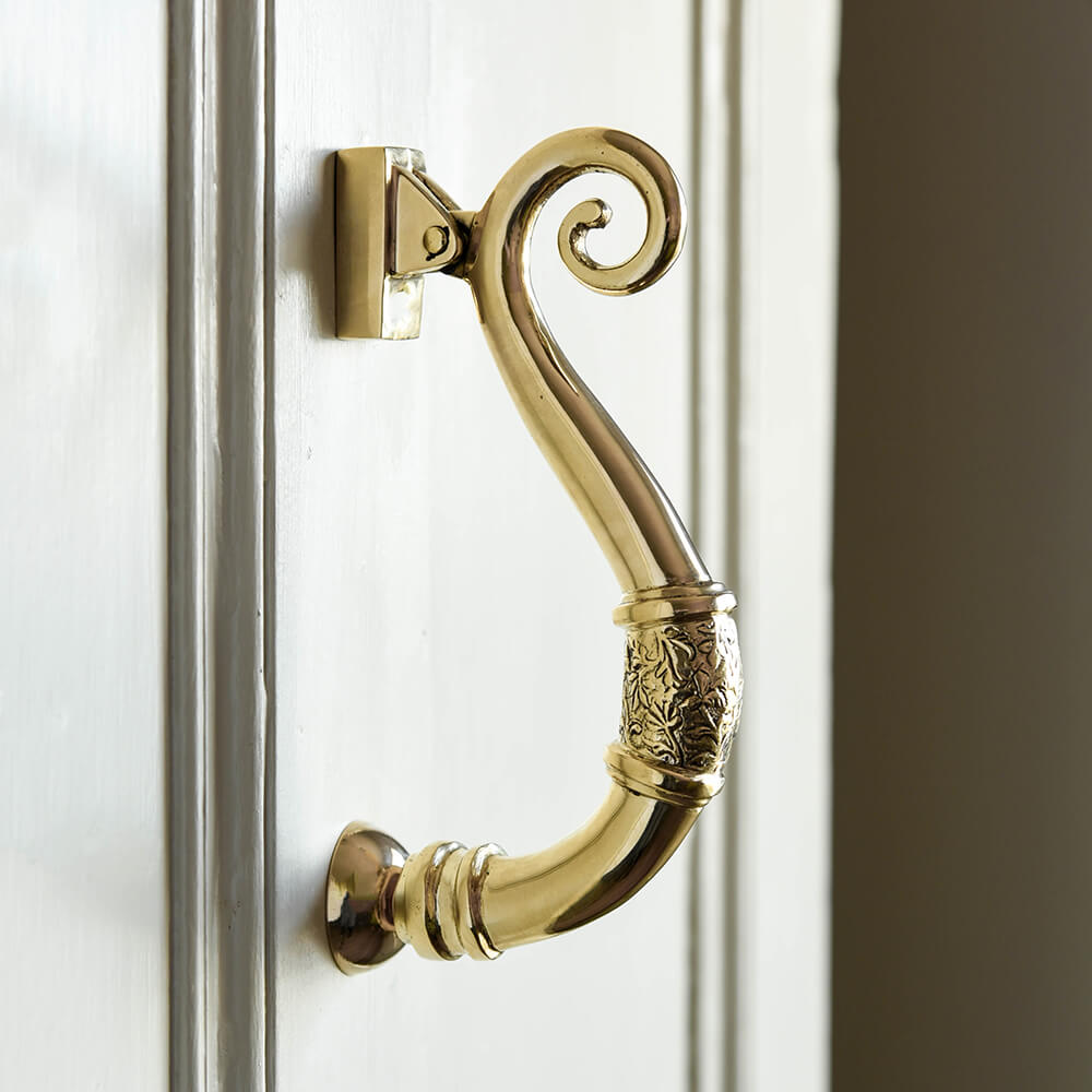 Brass Classic Victorian Door Knocker on a door