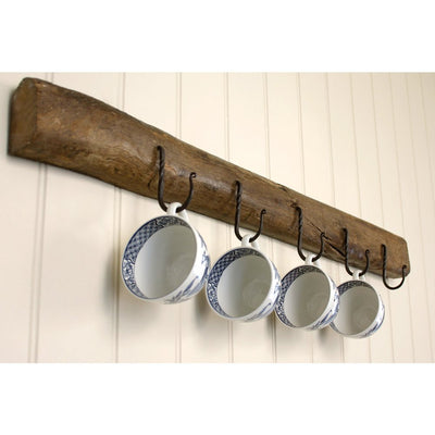 The Wrought Iron Cup Hooks in black beeswax finish holding cups