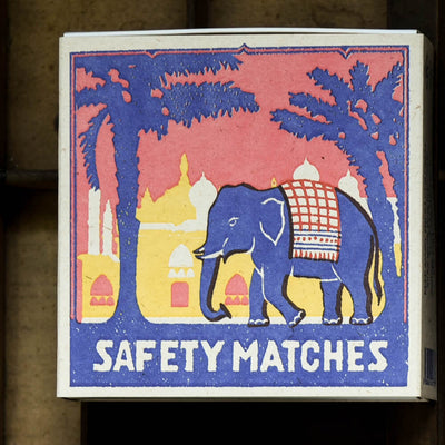 Purple elephant design on match box