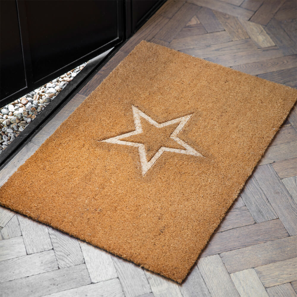 Door mat embossed with a star design