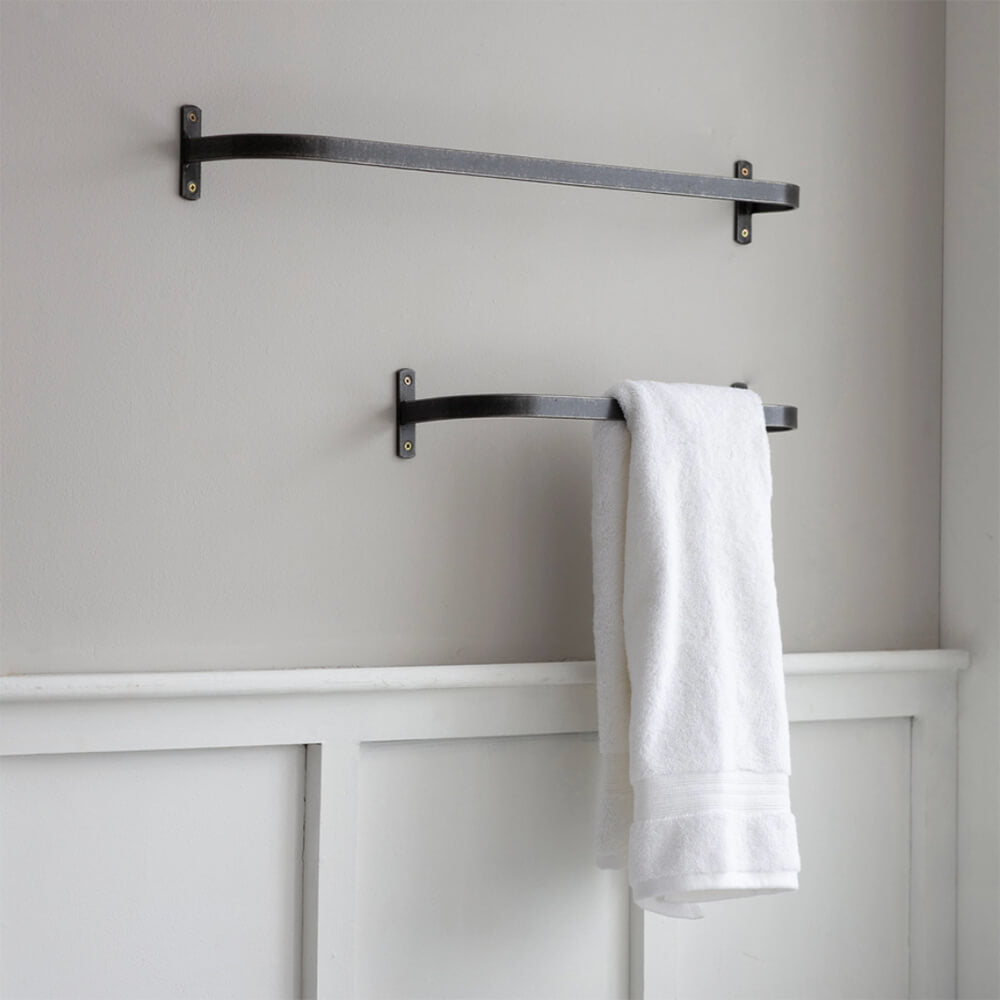 Farringdon Towel Rails large and small seen fixed to bathroom wall with towel