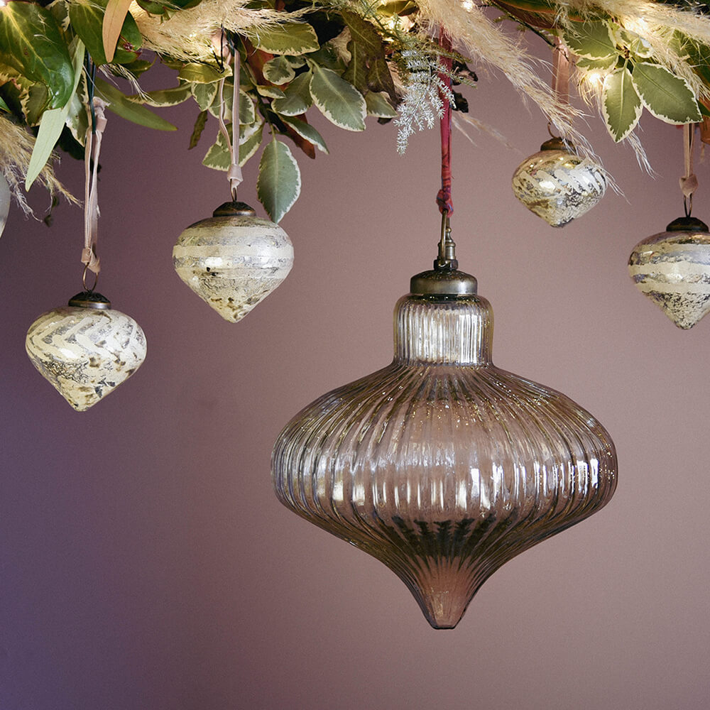 Eliza Giant Ribbed baubles in foliage branch with Christmas lights