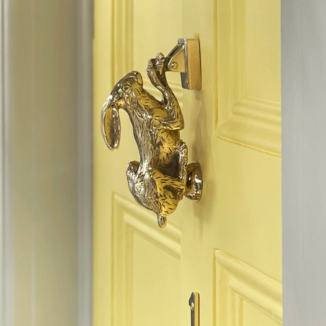 Hare Door Knocker on bright yellow front door