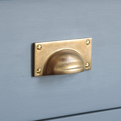 Detailed profile Hooded Drawer Pull in an Aged brass