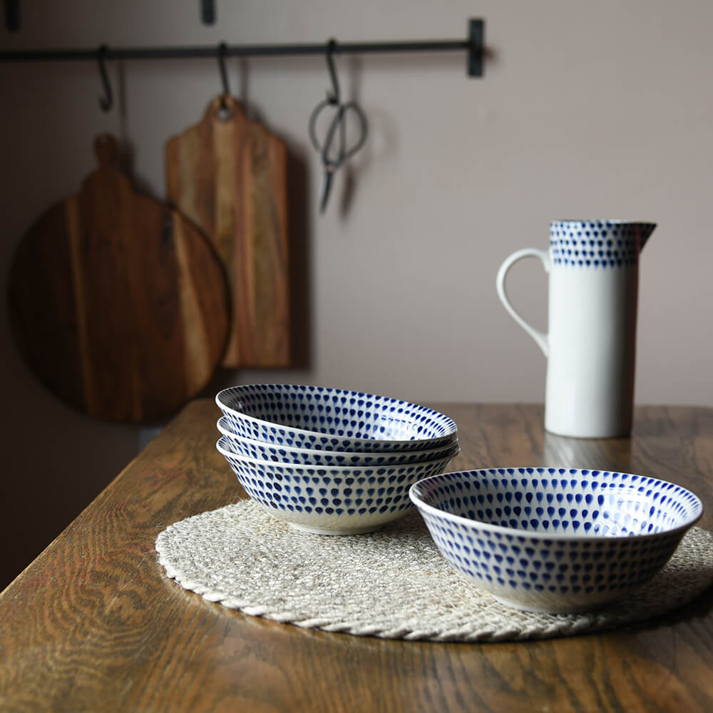 Indigo Drop Cereal Bowl on table in kitchen