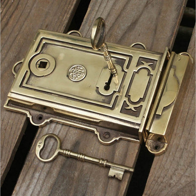 Large aged brass rim lock with set of keys