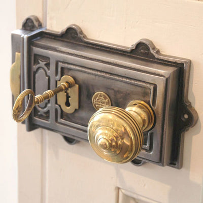 Large cast iron rim lock with brass door knob