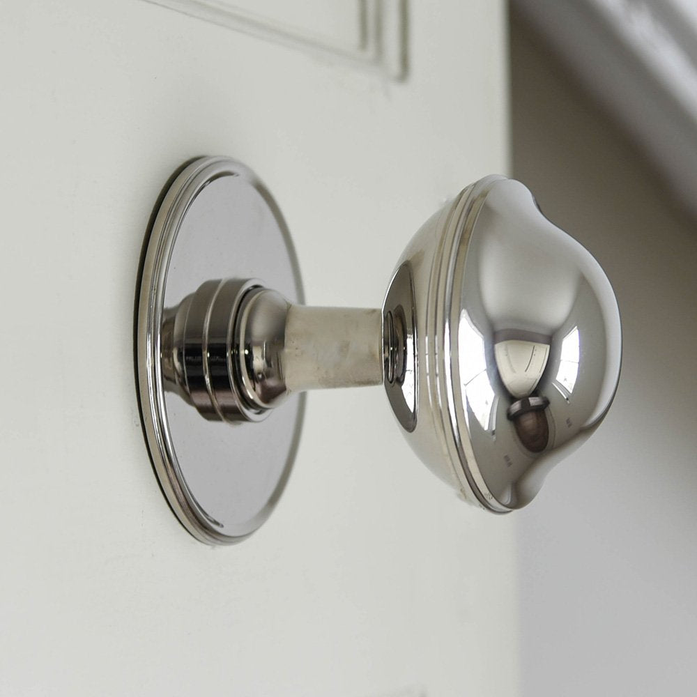Large round polished nickel door pull