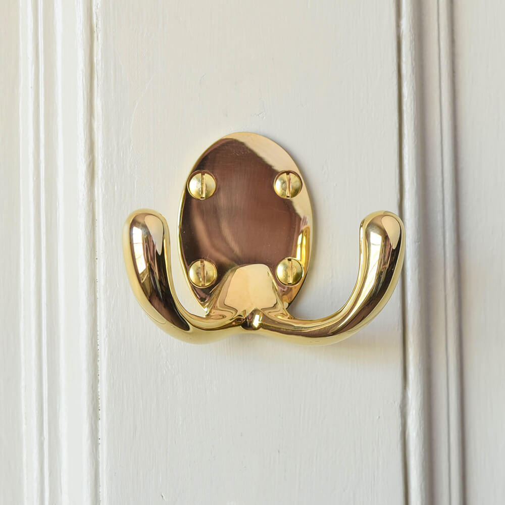 Large over sized wardrobe hook in polished brass