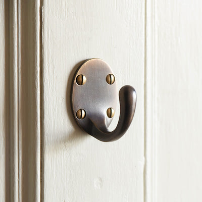 Distressed Antique Brass - Large Single Wardrobe Hook on a door