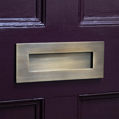 Light Antique Brass Letterplate on purple door