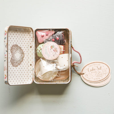 Maileg cakes and tableware packaged in suitcase
