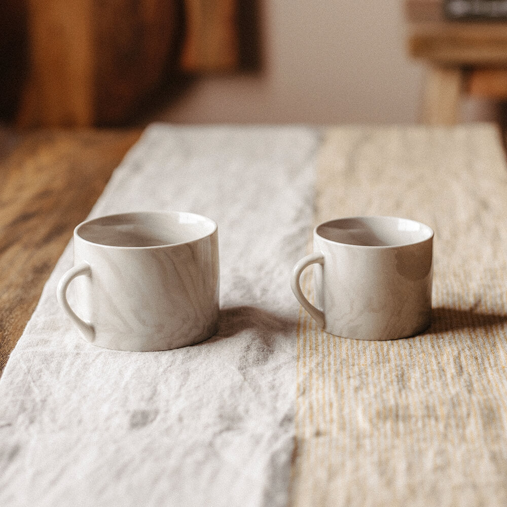 Natural Maya Mugs on table showing two sizes
