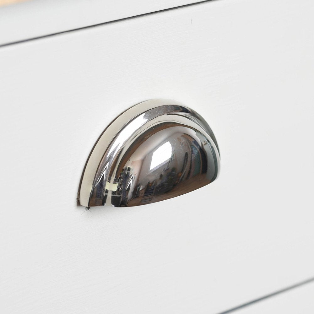The regency concealed drawer pull in a polished nickel finish