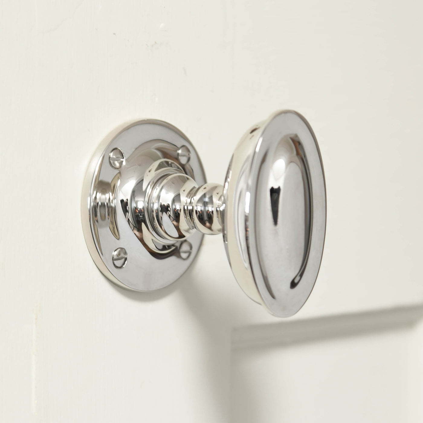 Oval shaped door knob with ridged detail