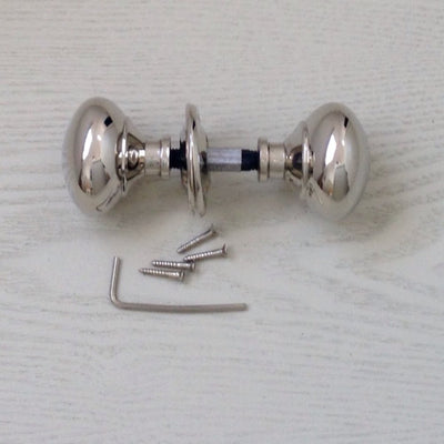 Small nickel cottage bun door knob with fittings