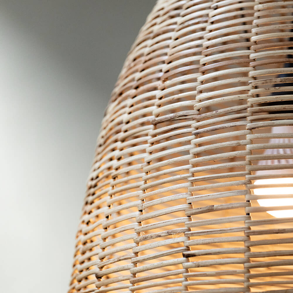 Detail of Wicker conical shaped pendant light fitting in a hallway