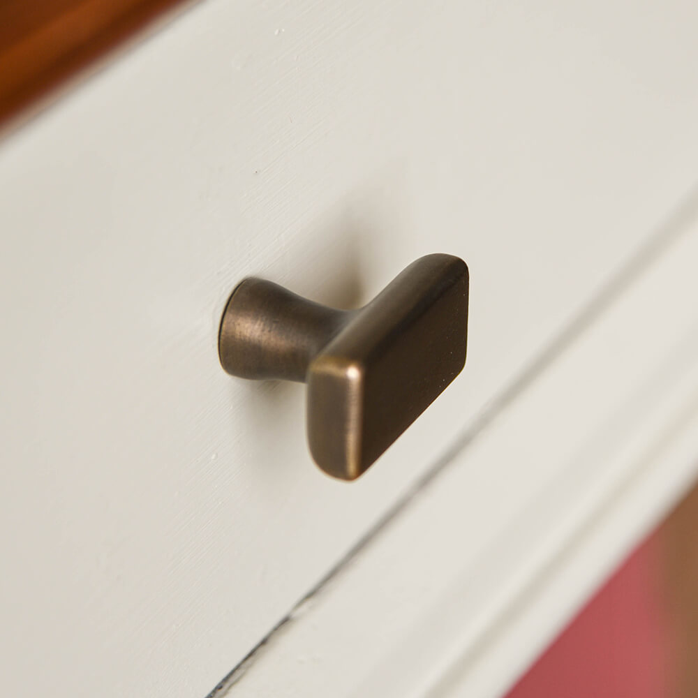CAPITAL CABINET KNOB SEEN FROM the side DISTRESSED ANTIQUE BRASS