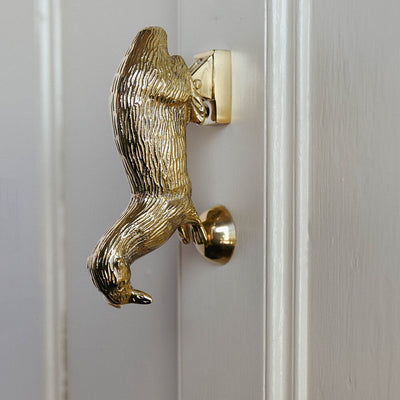otter door knocker seen from the side