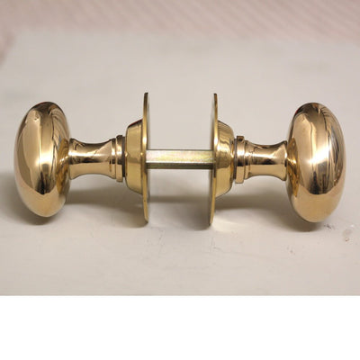 Oval brass door knobs with spindle