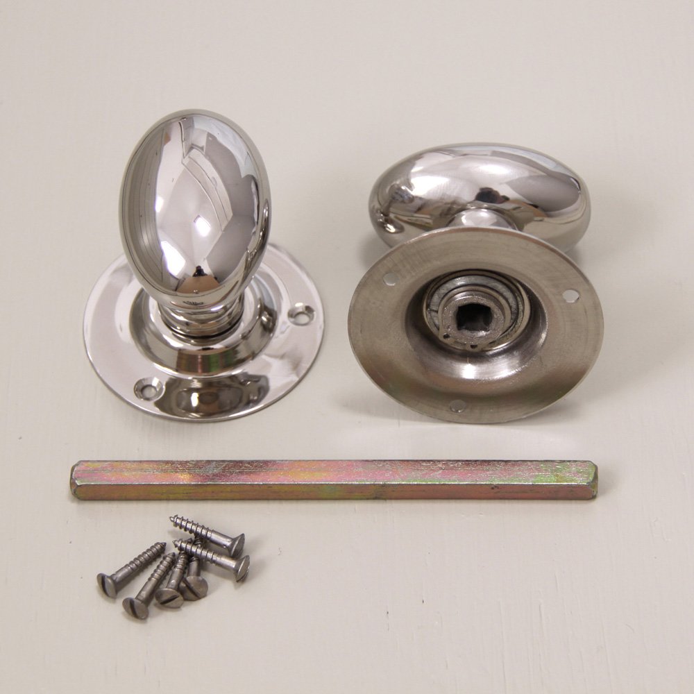 Polished nickel oval door knobs with fittings