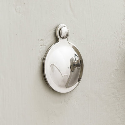 Round keyhole escutcheon with cover