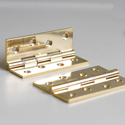 A pair of 4 inch Butt Hinges in Polished Brass Finish