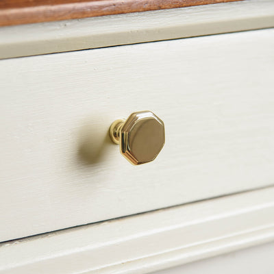 FLAT TOP OCTAGONAL CABIENT KNOB WITH NARROW NECK ON DRAWER taken from the front to show shape