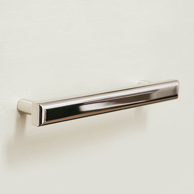 Polished Nickel Pillow Pull Handle on a drawer