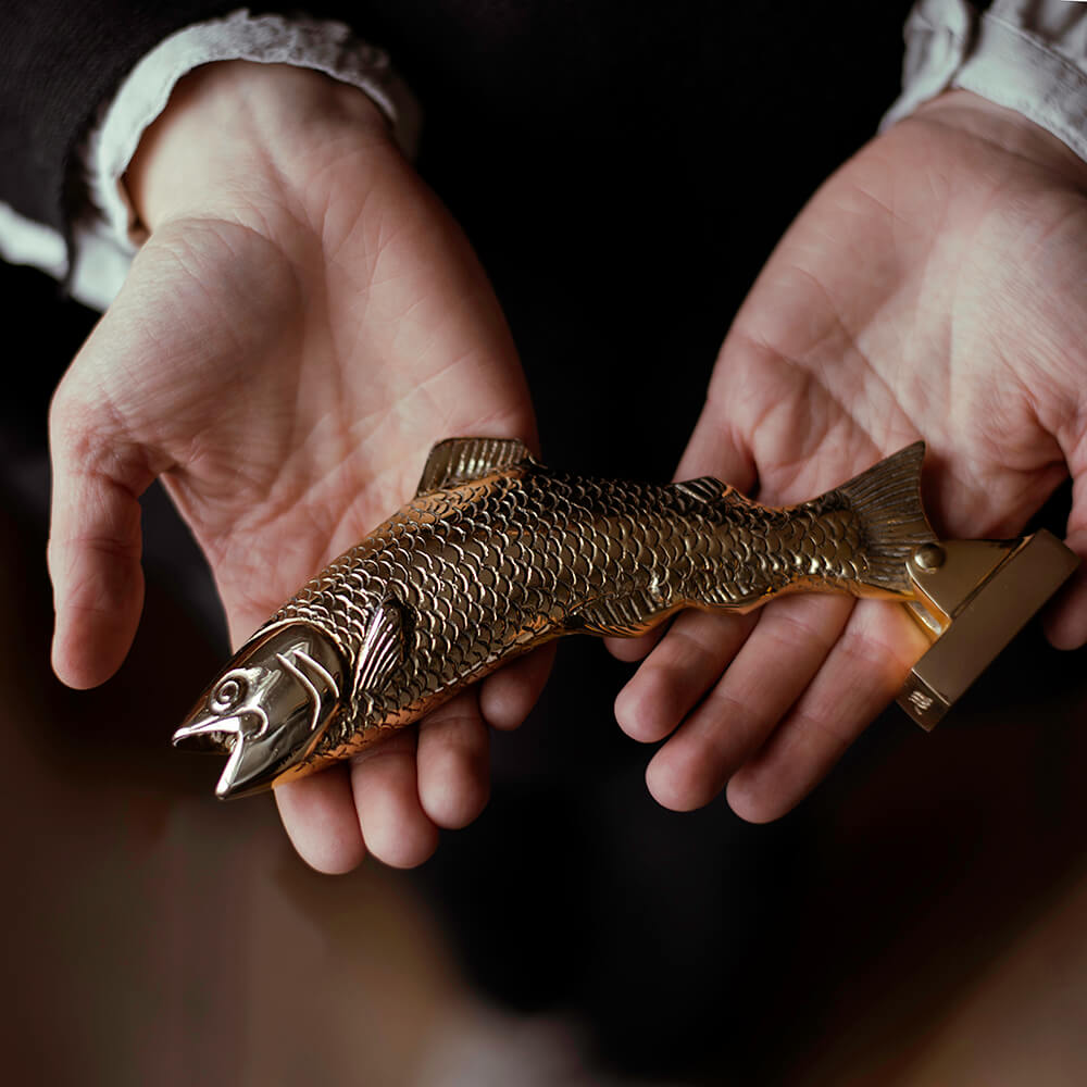 Salmon Fish Door Knocker in hands
