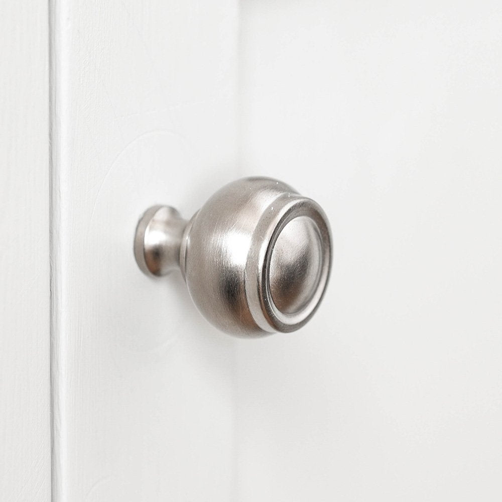 Round cabinet knob with flat top and satin nickel finish