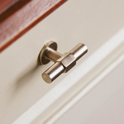 fusion t bar cabinet knob in satin nickel on kitchen unit painted cream