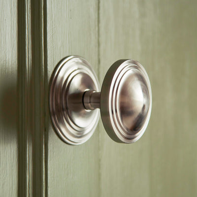 Satin Stainless Steel Round Art Deco Centre Door Pull on door painted in Lichen