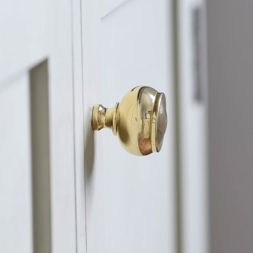 Brass ball shaped cabinet knob with ridged flat top