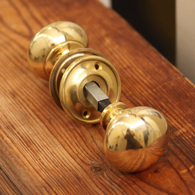 Small cottage bun door knobs with fittings