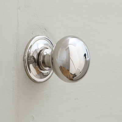 Small nickel cottage bun door knob