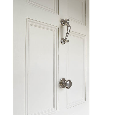 Small octagonal door pull in polished nickel with doctors door knocker