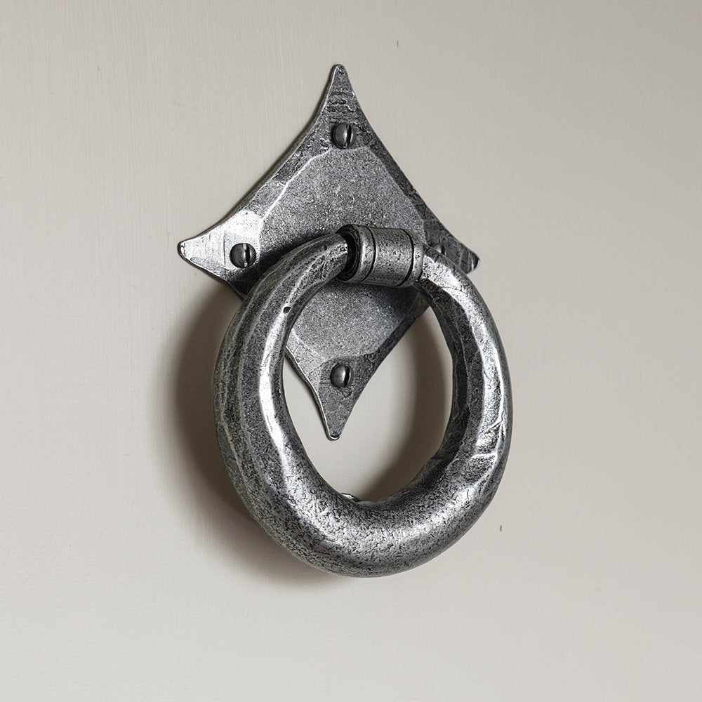 A Smithick door knocker in a pewter finish